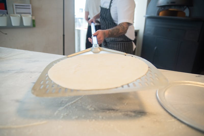 Punch pizza chefs crafting fresh Neapolitan pizza in Minneapolis kitchen