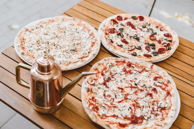 BBQ chicken pizza with caramelized onions and smoked gouda